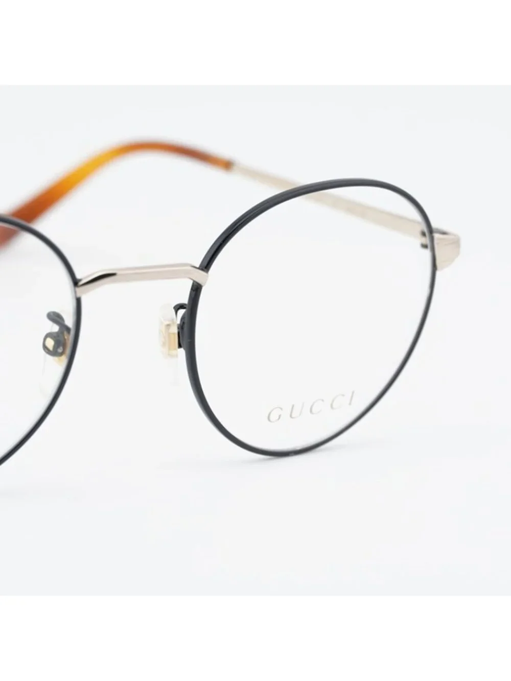 Gucci GG0581O 006 Eyeglasses Black/Gold 50mm Round Frame